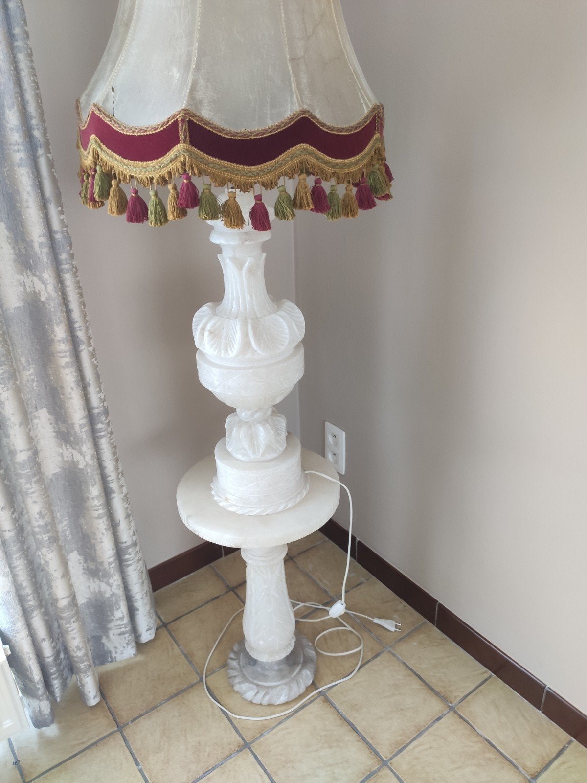 Albasten vloerlamp, Ophalen