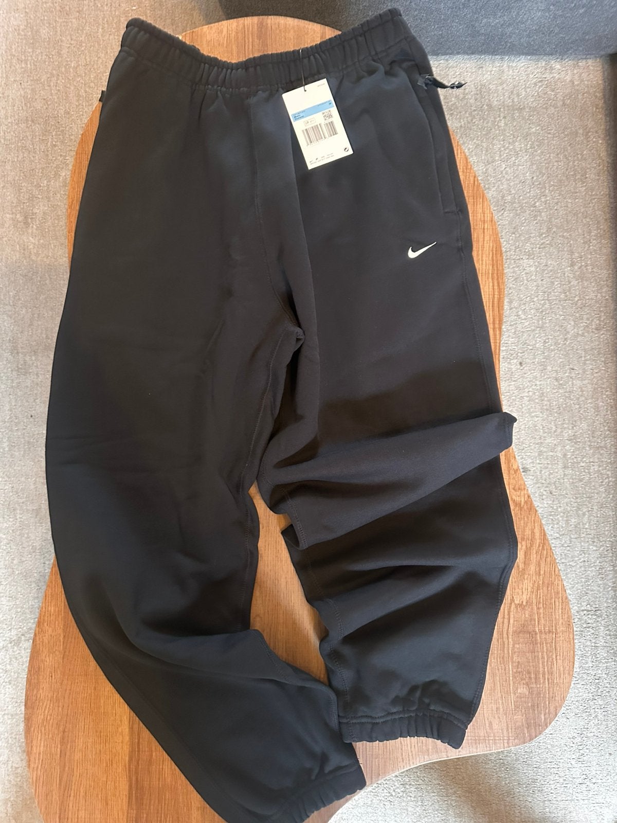 Pantalon Nike Solo Swoosh, Enlèvement ou Envoi, Neuf, Taille 48/50 (M), Noir