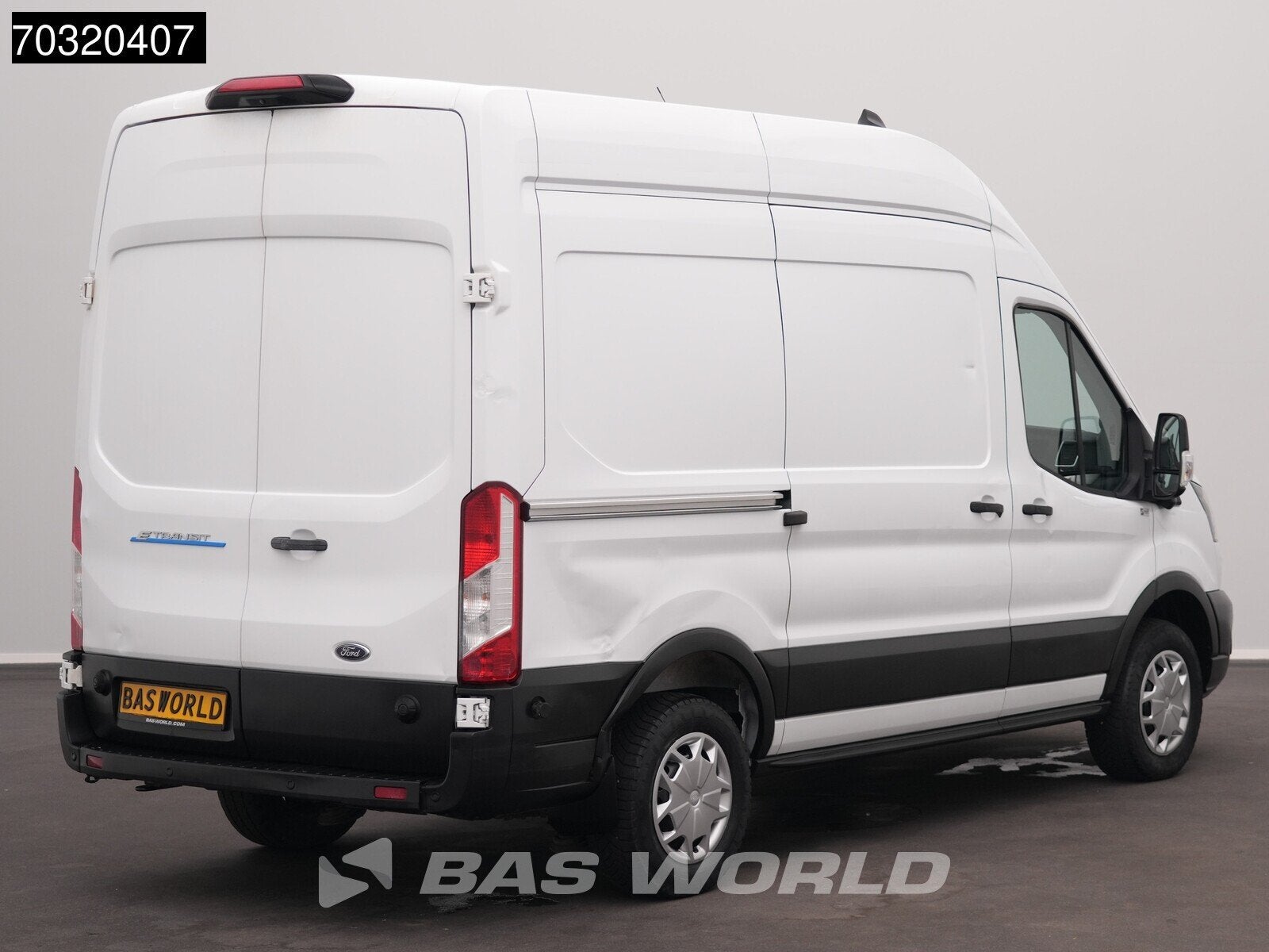 Ford e-Transit 184pk Elektrisch 68kWh 317km WLTP L2H3 Hoog D, Autos, Camionnettes & Utilitaires, Entreprise, 3 places, Capteur de lumière