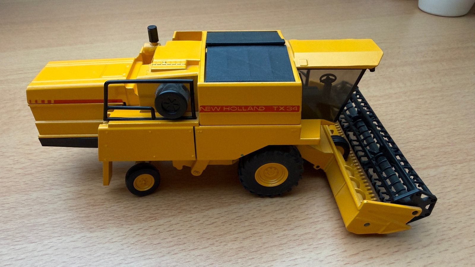 Te koop: New Holland TX34 graanmachine nieuwstaat, Ophalen, Nieuw, Hijskraan, Tractor of Landbouw