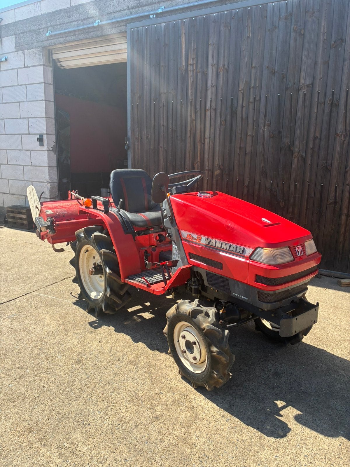 Minitractor Yanmar Ke-2 met frees, Ophalen