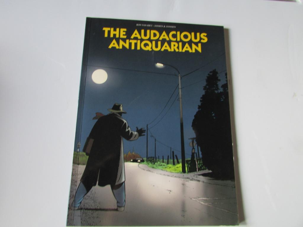L'ANTIQUAIRE AUDACIEUX, Livres, Enlèvement ou Envoi, Ron Van Riet, Une BD, Comme neuf