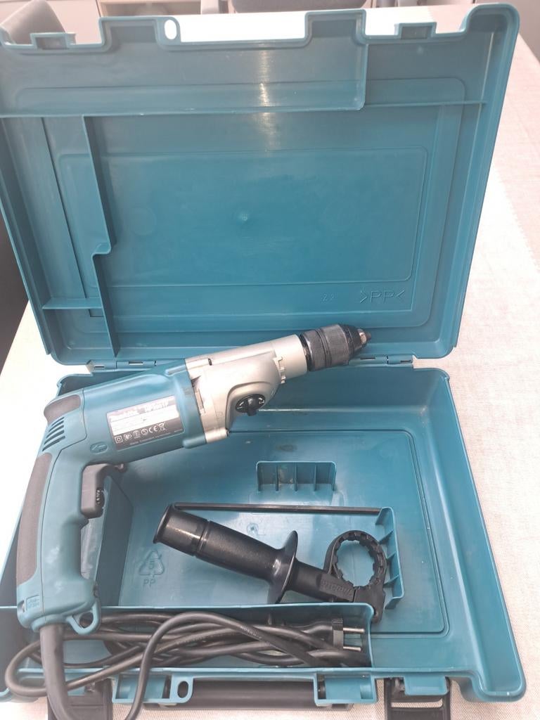 Makita klopboormachine, Enlèvement