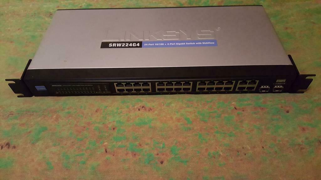 LINKSYS SRW224G4 24-PORT 10/100 4-PORT GIGABIT SWITCH WITH W, Ophalen of Verzenden, Gebruikt
