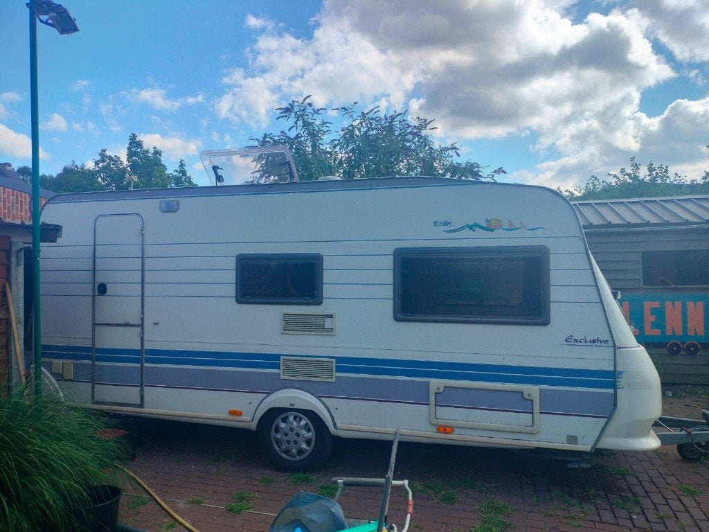 te huur hobby 495 exclusive 4p, Caravans en Kamperen, Caravans, 2 aparte bedden, Ringverwarming, Rondzit, Hobby