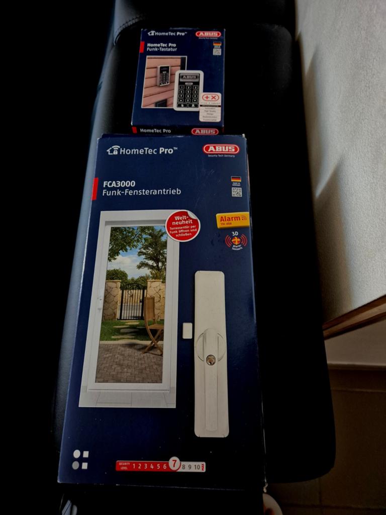 HomeTec Pro  draadloze raamaandrijving ABUS  (nieuwstaat), Doe-het-zelf en Bouw, Alarmsystemen, Ophalen of Verzenden, Zo goed als nieuw