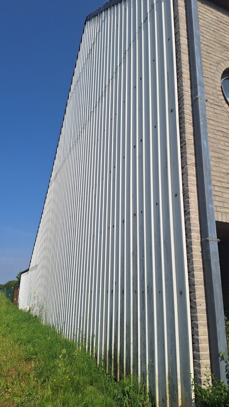 Stalen trapezium gevelplaten 5,5 m (+/- 100 m²), Ophalen