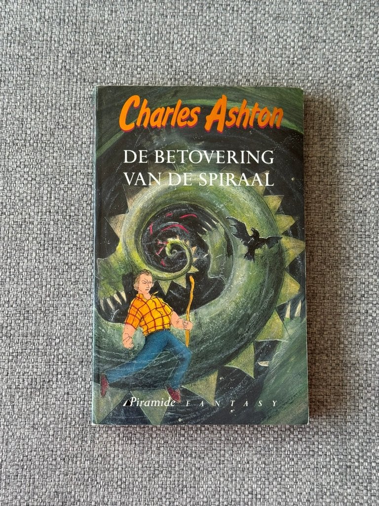 134. Boek - Charles Ashton - De betovering van de spiraal, Ophalen of Verzenden, Gelezen, Fictie