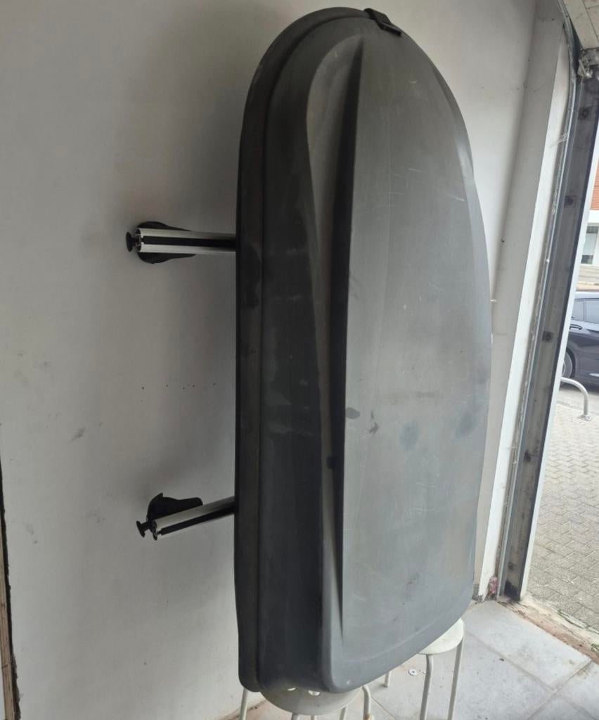 Box de toit avec barre, Enlèvement