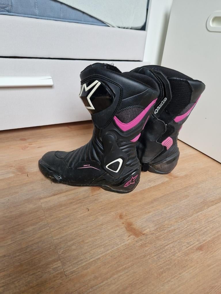 Motorlaarzen vrouwen alpinestars, Ophalen
