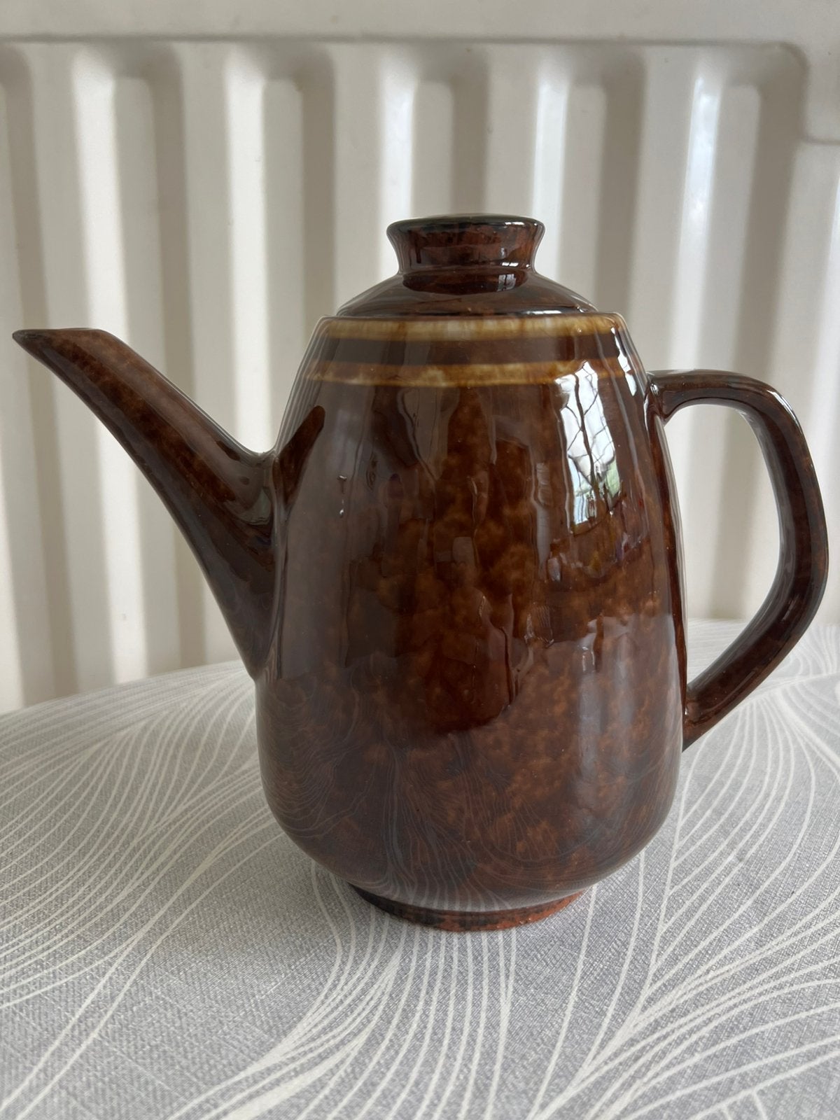 Keramische koffie/theepot uit bruine lavaglazuur, Ophalen