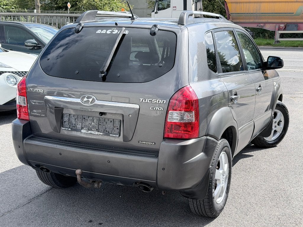 | Hyundai Tucson | Lichte Vracht | Automaat | Trekhaak |, Auto's, 1998 cc, Zwart, Bruin, Leder