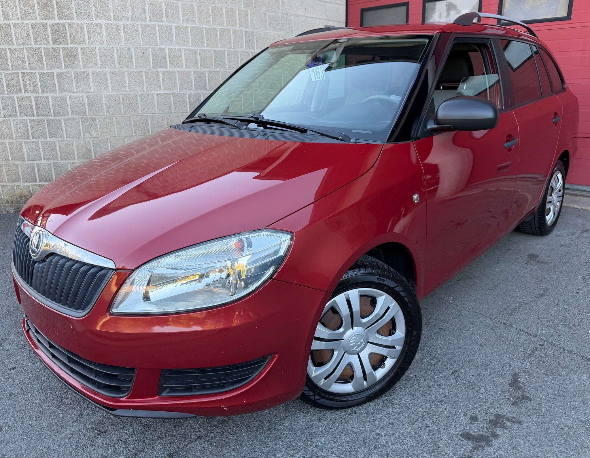 Skoda Fabia SW 1.2 CR TDi Ambition DPF + CLIM, Autos, Rouge, Euro 5, Achat, Boîte manuelle