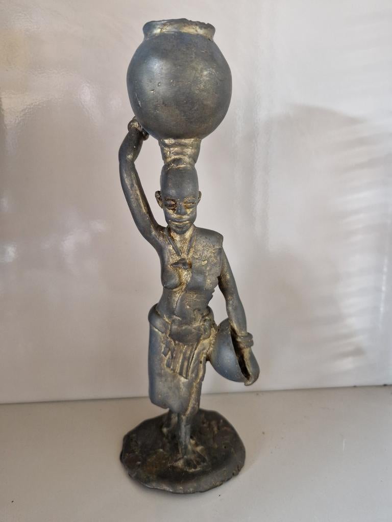 Afrikaans bronzen beeldje., Ophalen