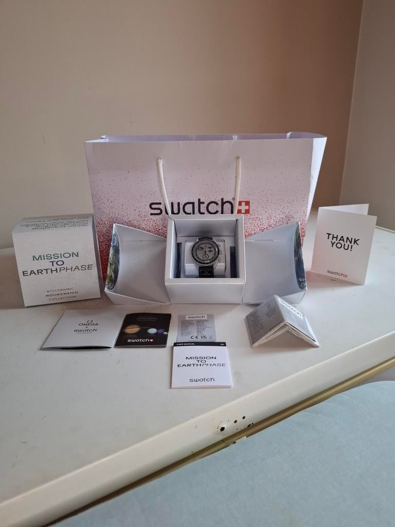 Swatch x Omega Bioceramic MoonSwatch Mission To Earthphase, Handtassen en Accessoires, Horloges | Heren, Staal, Polshorloge, Overige materialen