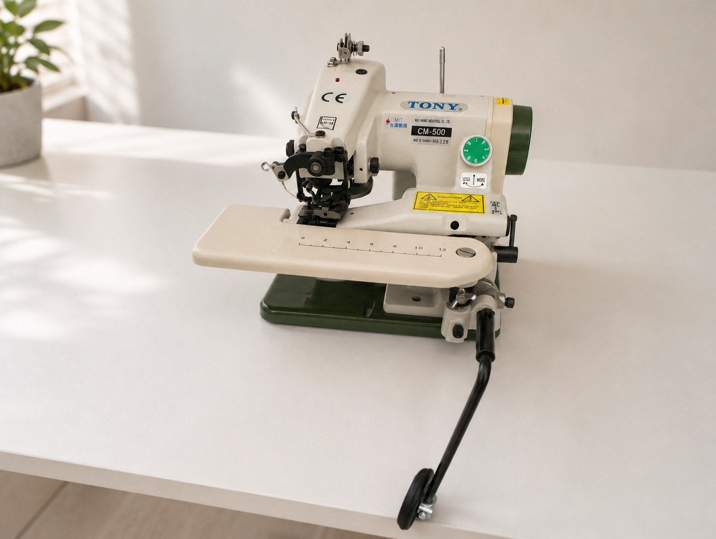 TONY CM-500 industriële blindsteekmachine, Ophalen