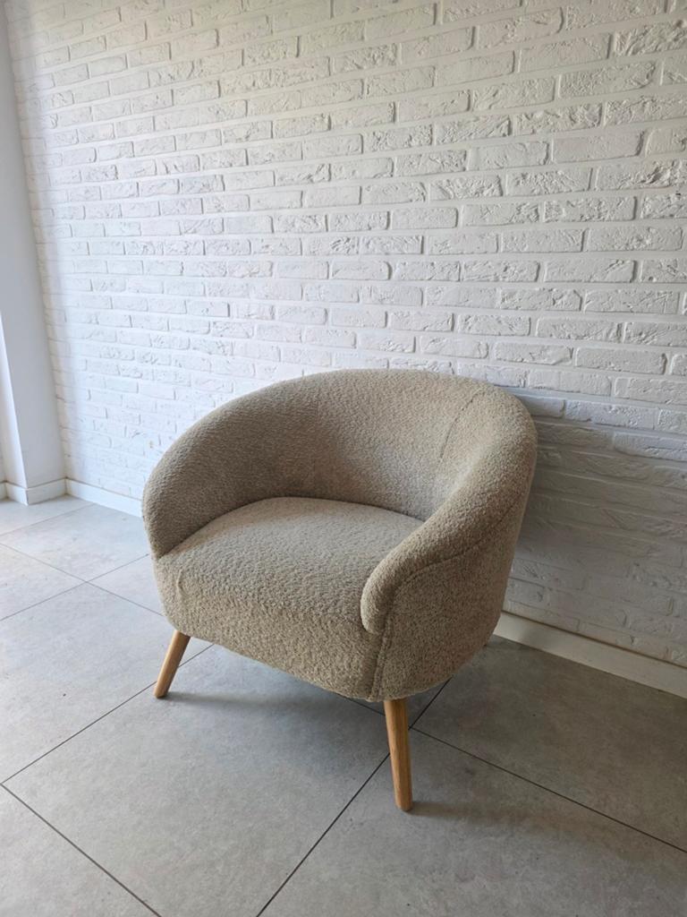 Beige fauteuil, Ophalen