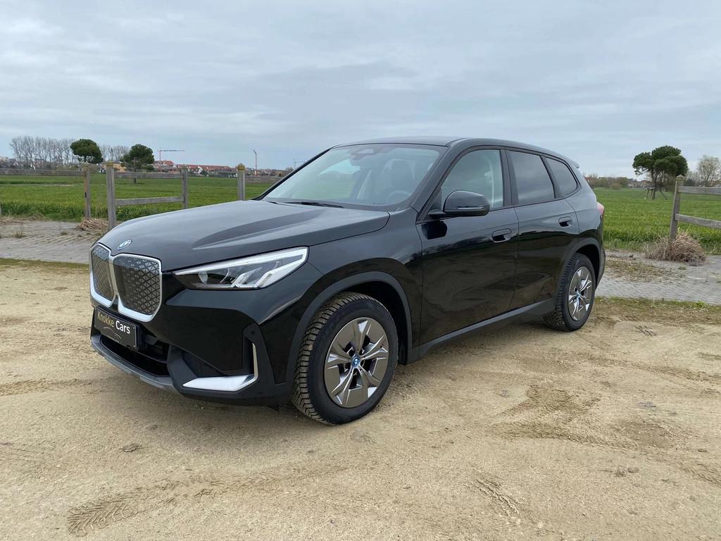 BMW iX1 Verkocht,Sold,Vendu (bj 2024, automaat), Auto's, Automaat, Gebruikt, Zwart, Zwart