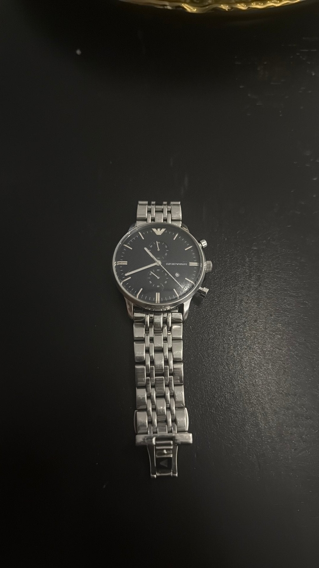 Armani horloge (officieel), Ophalen, Gebruikt