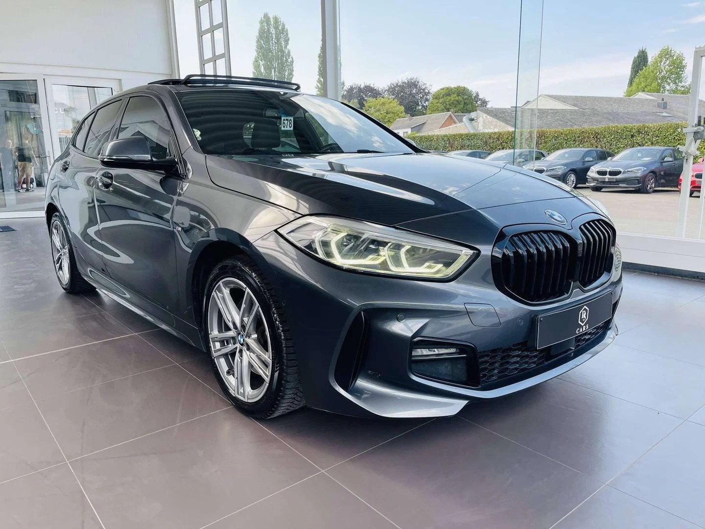 BMW 1 Serie 116 iA * GARANTIE + PACK M + TOIT PANO + COKCPIT, Auto's, 116 g/km, 1 Reeks, Gebruikt, 5 deurs