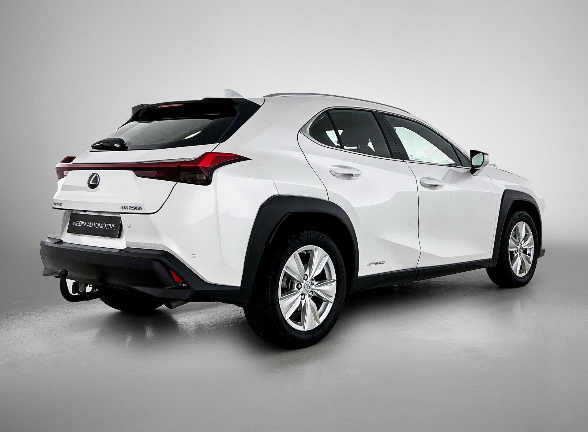 Lexus UX 2.0L 250H Business Edition | Trekhaak | Navigatie |, Auto's, Stof, Gebruikt, Bedrijf, 5 zetels