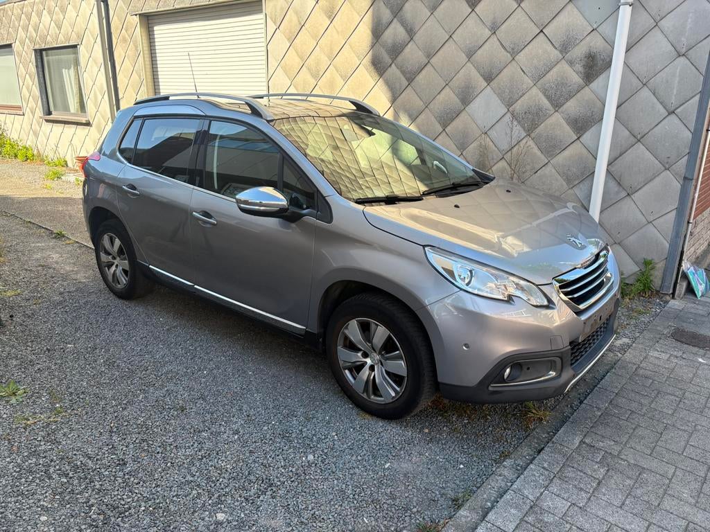 Peugeot 2008 , 63000 km  ( 1 jaar garantie ) Benzine, Auto's, 1199 cc, Leder en Stof, Bedrijf, Handgeschakeld