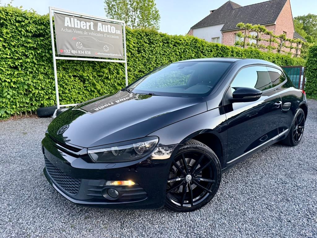 VOLKSWAGEN SCIROCCO 1.4 ESSENCE BOÎTE AUTOMATIQUE, Auto's, 4 cilinders, Zwart, Bedrijf, 118 kW