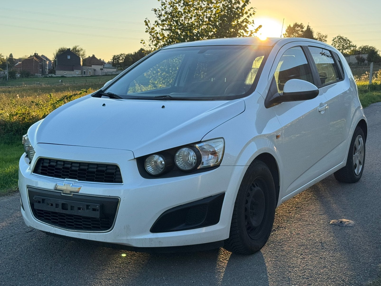 Chevrolet Aveo 1.2i 2013 Euro 5 Airco Full carnet 1Main Ctok, Stof, 120 cc, Wit, Bedrijf
