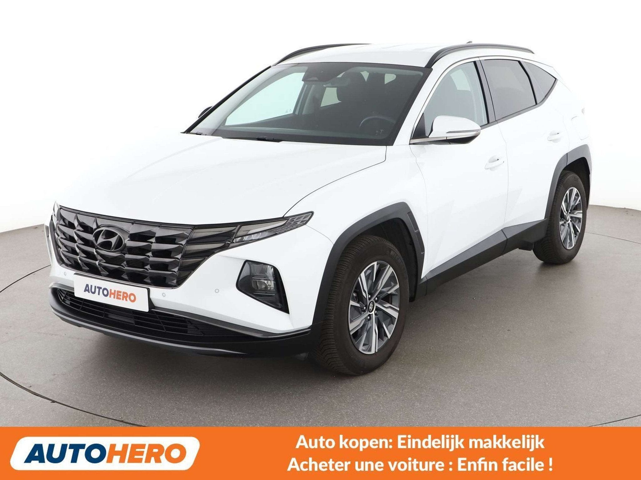 Hyundai Tucson 1.6 T-GDI Hybrid Prime 2WD (bj 2021), Auto's, Stof, Gebruikt, 169 kW, Elektrisch