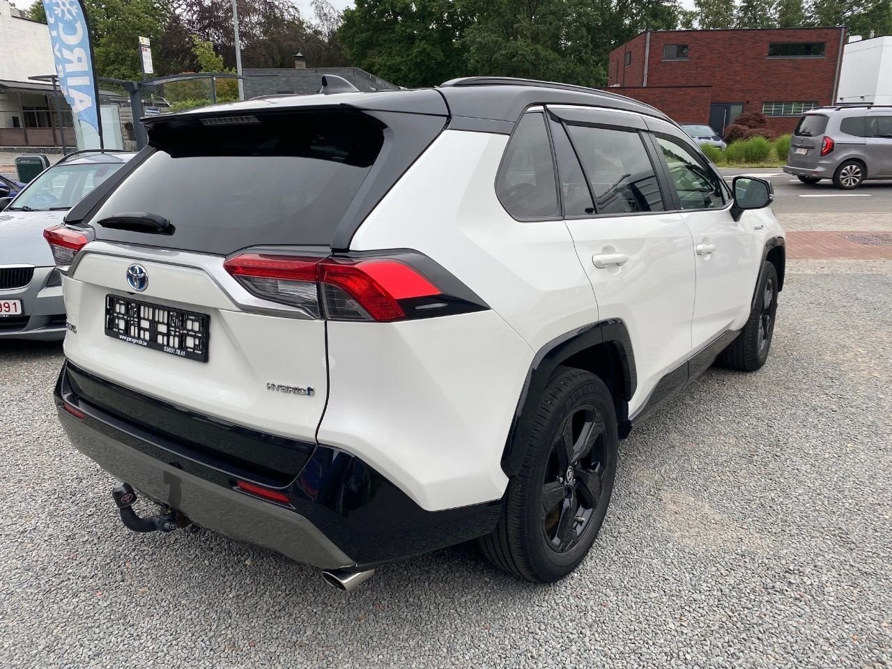 Toyota RAV4 Hybrid 4x2 STYLE FULL OPTION MET GARANTIE, Autos, Cuir, 2487 cm³, Entreprise, Noir