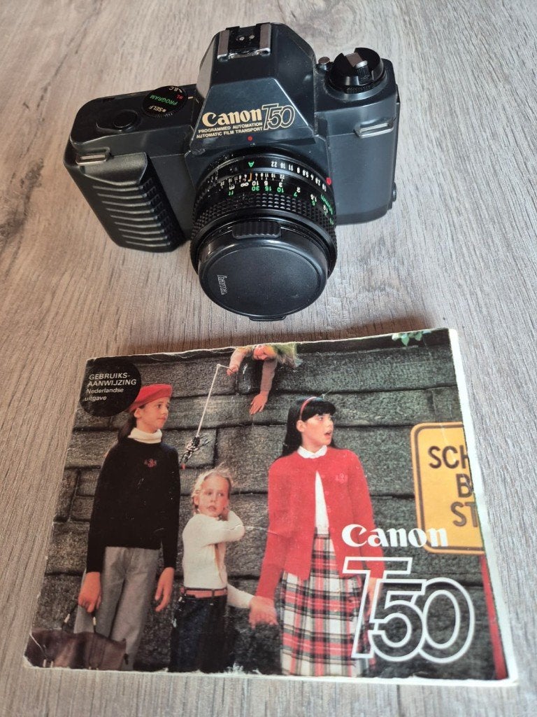 Canon T50 met Canon FD 50mm-lens en originele handleiding., Ophalen, Gebruikt, Canon
