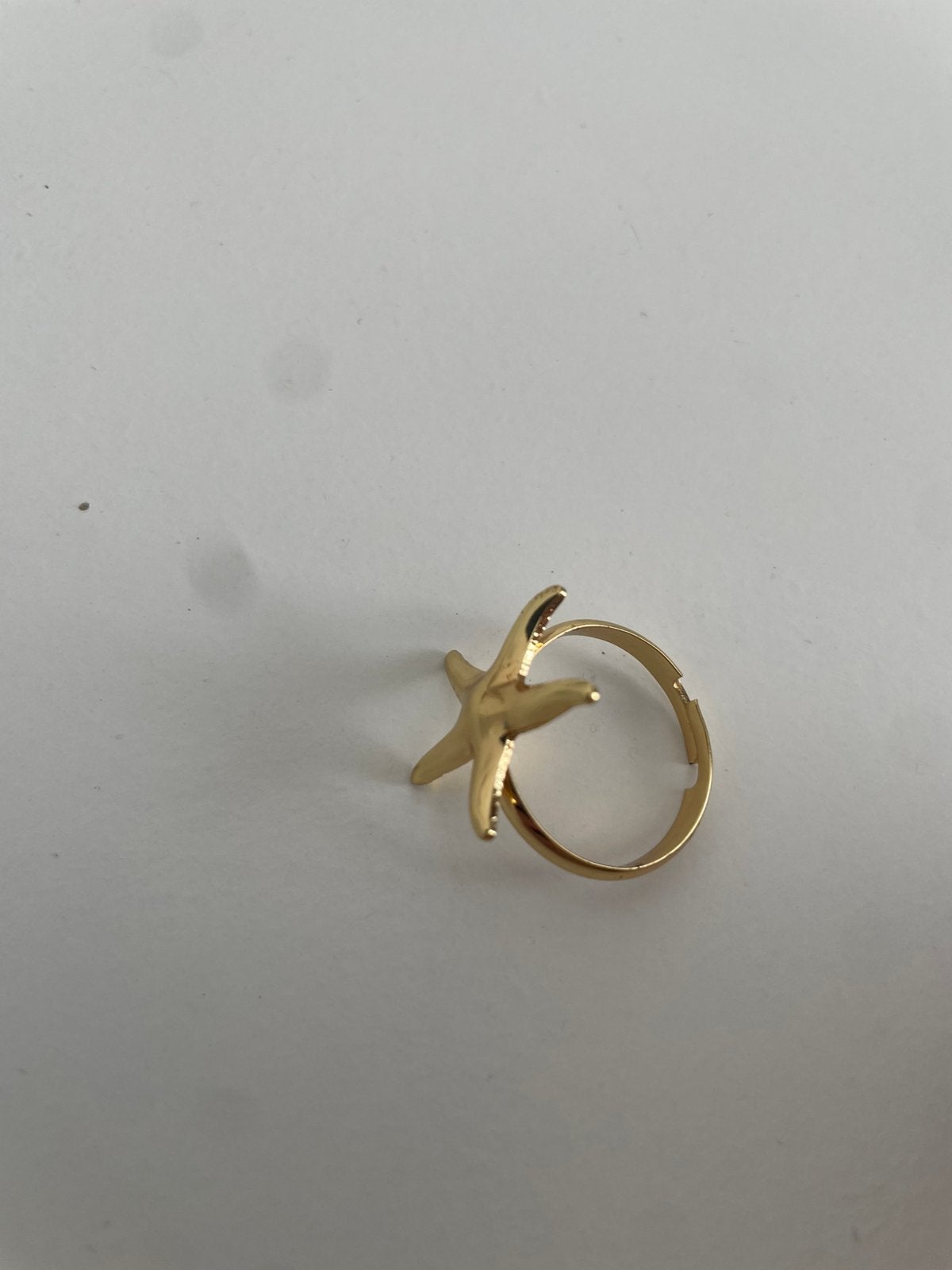 Gouden zeesterring, Handtassen en Accessoires, Piercings, Ophalen, Zo goed als nieuw