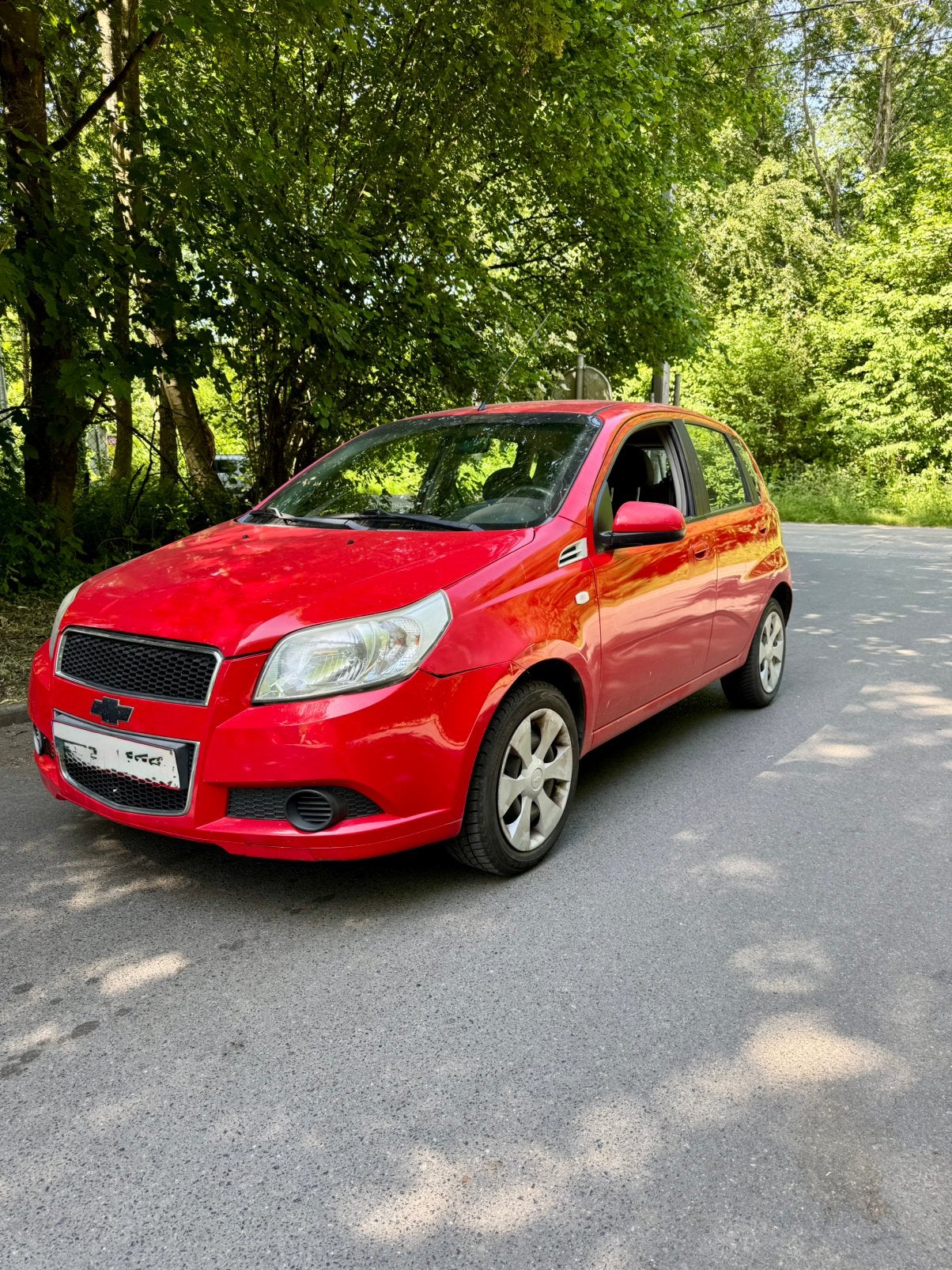 Chevrolet aveo ls 2010 1.2 benzine klaar voor registratie, Auto's, Chevrolet, Aveo, 5 deurs, Particulier, Rood