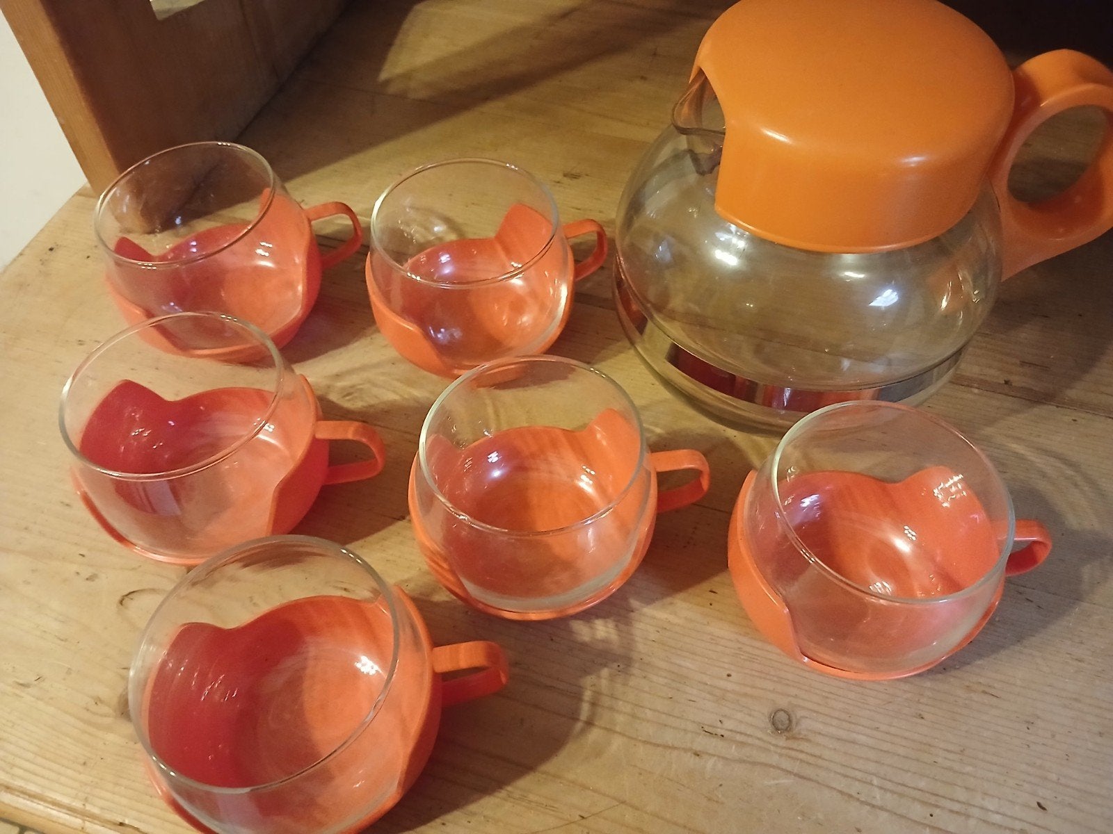 retro oranje theeset, Ophalen