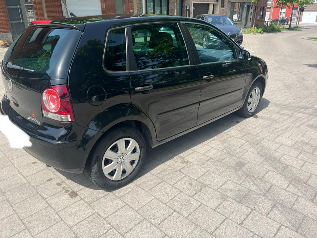 Vw Polo 9n te koop benzine zwart dakhemel en met keuring!, Voorwielaandrijving, 4 deurs, Stof, Zwart
