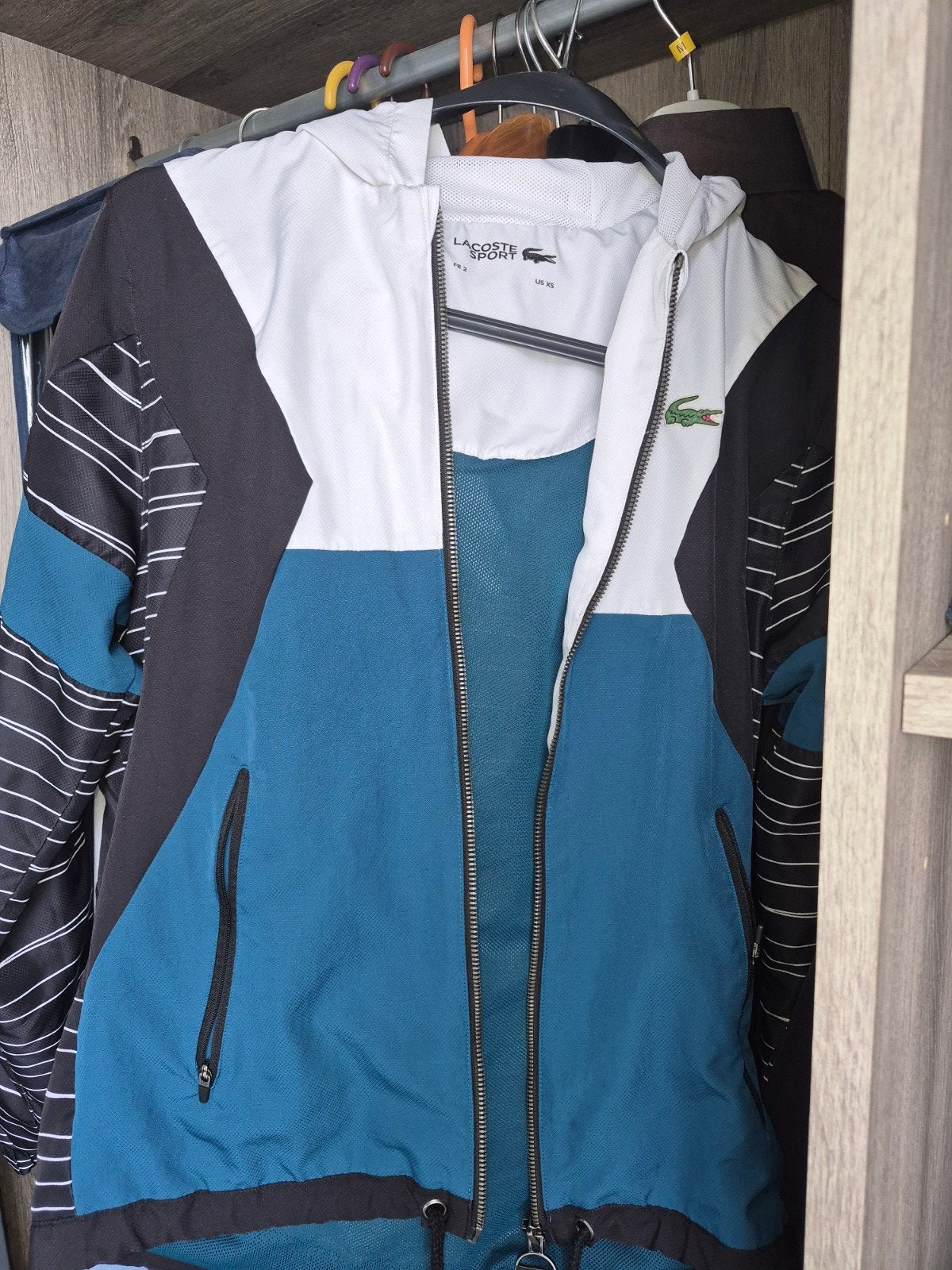 Lacoste Sport jack met capuchon - Maat XS - Zeer goede staat, Blauw