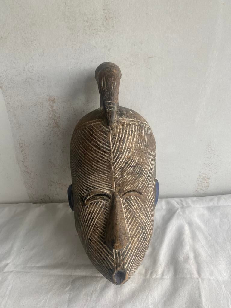 Masque Songué messager, Enlèvement ou Envoi