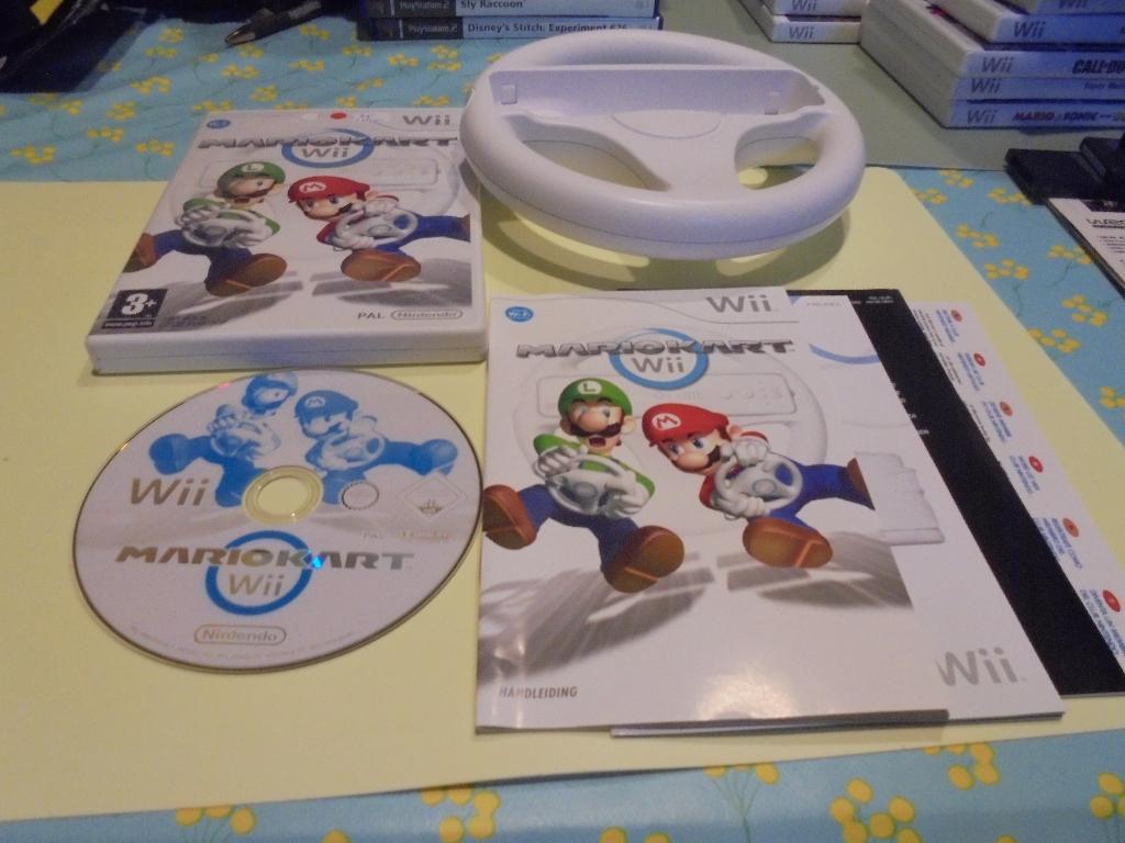 WII Mario Kart + stuur origineel (CIB), Gebruikt, Racen en Vliegen, Ophalen of Verzenden, 3 spelers of meer