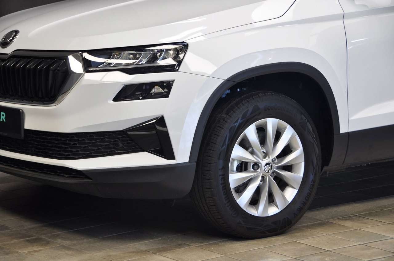 Skoda Karoq 1.5 TSI 150 DSG7 SELECTION, Auto's, 1498 cc, 4 cilinders, 0 kg, Wit