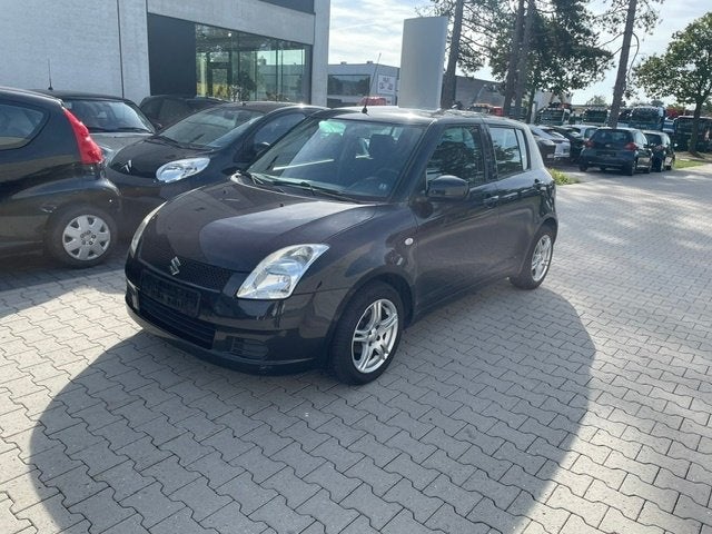 Suzuki Swift 1.3I, Manueel, 4 Deuren, keuring + Garantie, Voorwielaandrijving, Stof, 140 g/km, Zwart