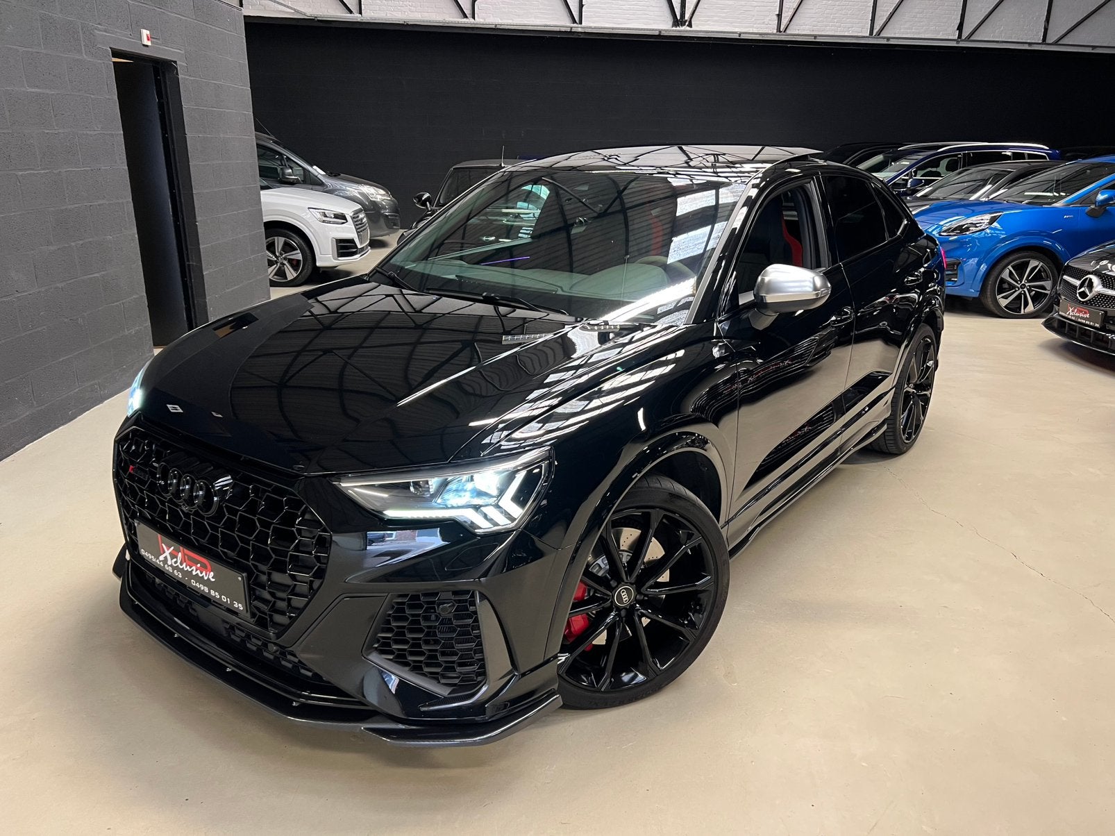 AUDI RSQ3 *PANO*CAMERA*CARBONE*GARANTIE*, Auto's, Dealer onderhouden, Zwart, Bedrijf, 5 zetels