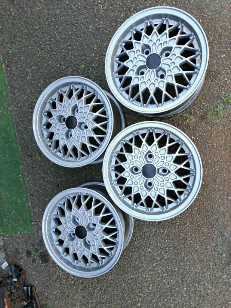 Originele  Nissan honingraat velgen, Auto-onderdelen, Banden en Velgen, 14 inch, Velg(en), All Season, Gereviseerd