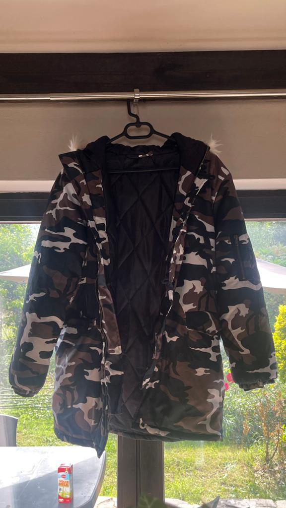Manteau, Enlèvement, Comme neuf