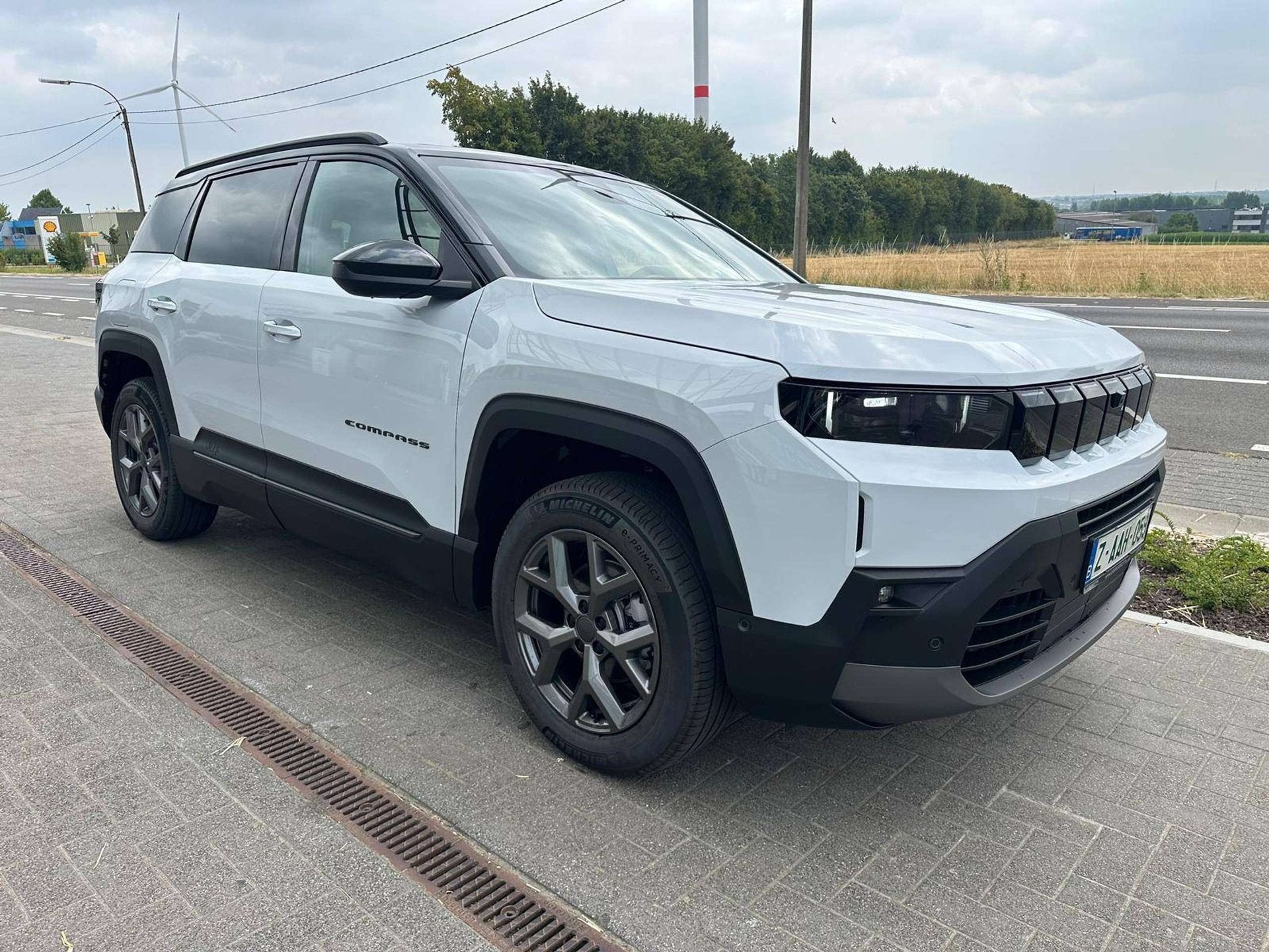 Jeep Compass 1.2 Turbo e-Hybrid First Edition DCT First Edit, Auto's, Automaat, Dealer onderhouden, 1199 cc, Wit