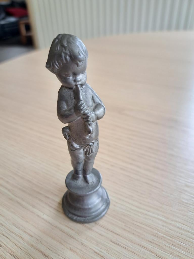 Tinnen figuur, Ophalen
