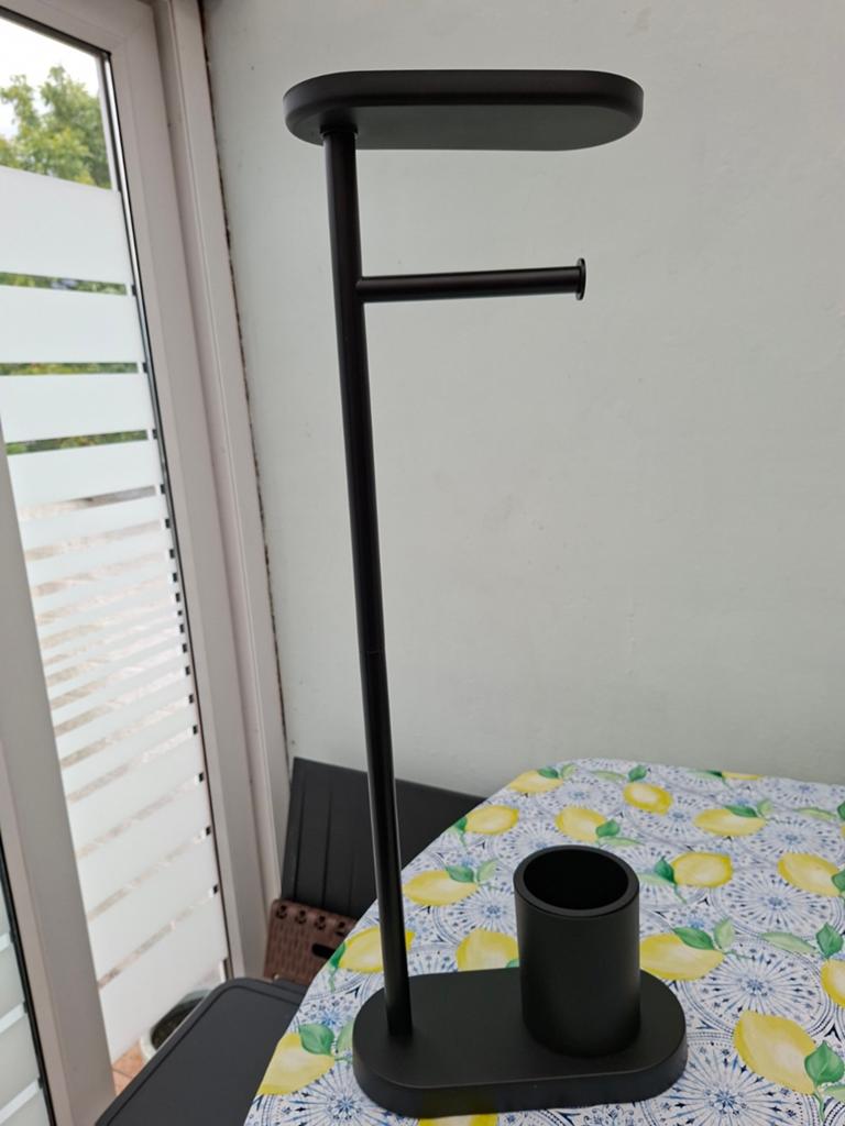 Toiletpapierhouder, Ophalen