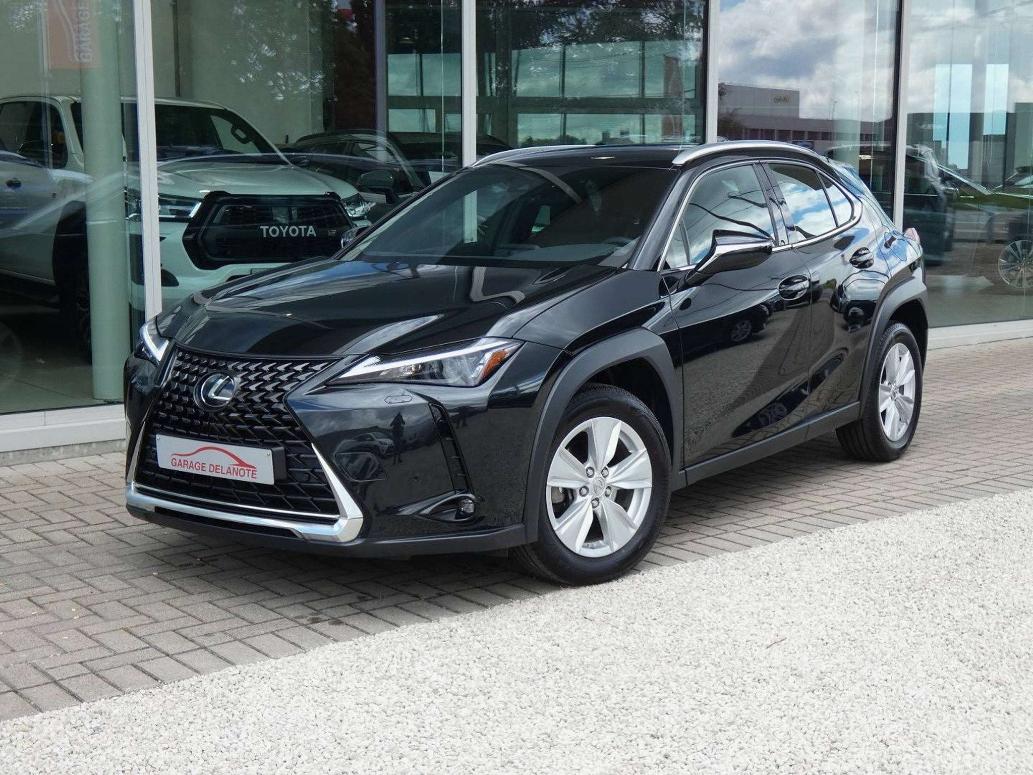 Lexus UX 250H HYBRID +ZWART LEDER +Zetelverwarming +Dodehoek, Auto's, Lexus, Gebruikt, 4 cilinders, Zwart, Bedrijf