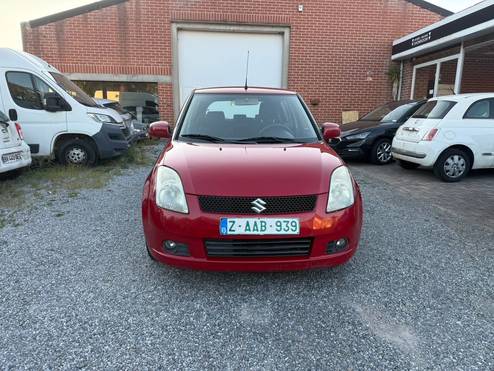 Suzuki Swift 1.3GLX AIRCO, Autos, Suzuki, Rouge, Boîte manuelle, Tissu, Euro 4