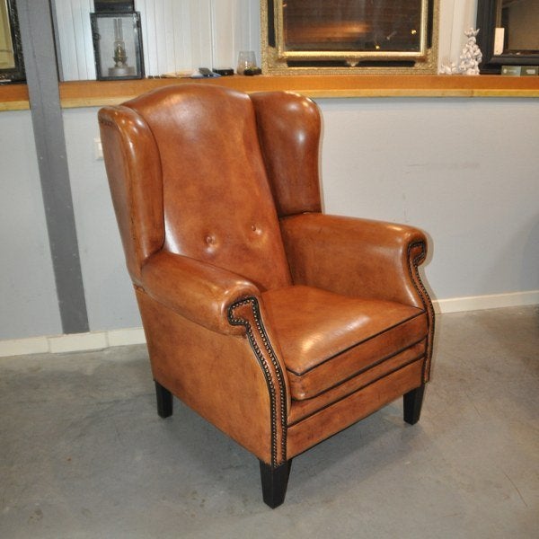 Nieuwe grote oorfauteuil in schapenleer., Huis en Inrichting, Ophalen, Nieuw, Leer