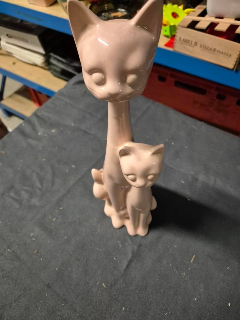 Porseleinen kat, Ophalen